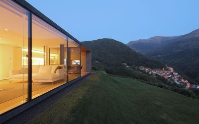 “Like a stone in the landscape”… Angular home in the Swiss Alps